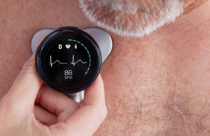 A photo of an Eko Health Core digital stethoscope on a patient's chest.